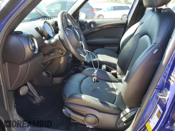 2016 MINI Countryman S with VIN WMWZC5C56GWP49473, listed as a Copart auction lot 50752355 with 118,060 mi miles and Salvage Title. Bid and sale history available at DreamBid. Image 7.