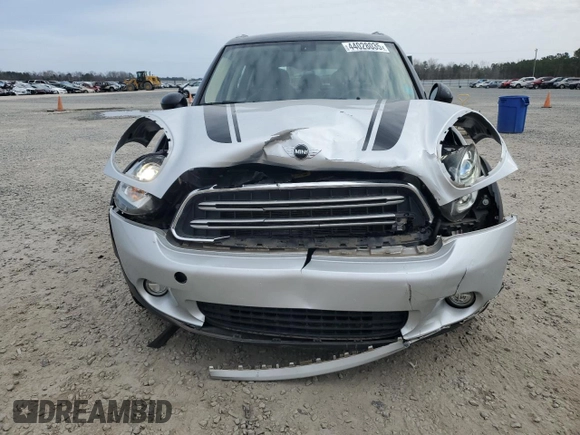 2016 MINI Countryman with VIN WMWZB3C50GWR48610, listed as a Copart auction lot 44028035 with 69,801 mi miles and Salvage title. Bid and sale history available at DreamBid. Image 5.