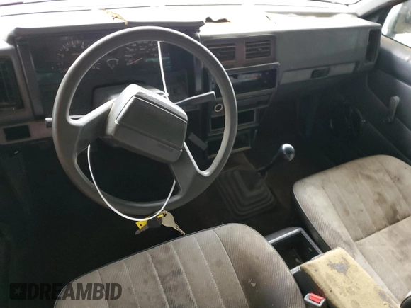 1993 Nissan Frontier z VIN 1N6SD16S1PC305038, wystawiony jako Copart lot #81405854 z przebiegiem 316 582 mil mil oraz Szkoda całkowita • Salvage title. Historia ofert i sprzedaży dostępna na DreamBid. Obrazek 8.