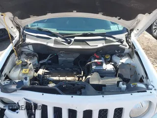 2014 Jeep Patriot Latitude with VIN 1C4NJPFA8ED550221, listed as a IAAI auction lot 41919419 with 185,386 mi miles and . Bid and sale history available at carsss.com. Image 10.