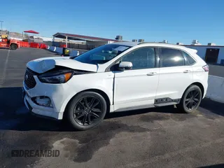 2020 Ford Edge SEL z VIN 2FMPK3J92LBB53467, wystawiony jako IAAI lot #41241115 z przebiegiem 58 183 mil mil oraz . Historia ofert i sprzedaży dostępna na DreamBid. Obrazek 14.