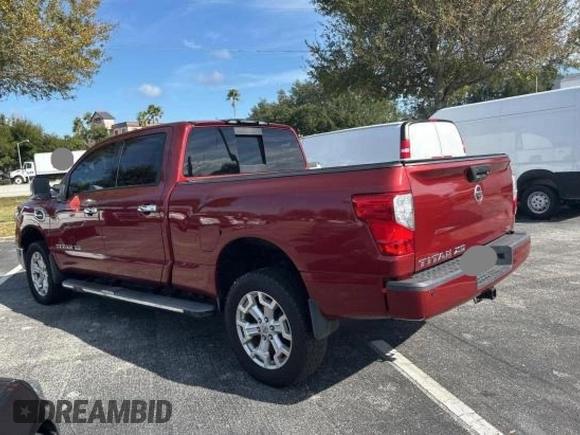 2016 Nissan Titan Platinum Reserve z VIN 1N6BA1F26GN512666, wystawiony jako Copart lot #84673544 z przebiegiem 120 182 mil mil oraz Czysty tytuł • Clean title. Historia ofert i sprzedaży dostępna na DreamBid. Obrazek 3.