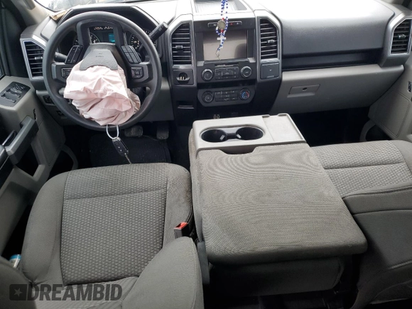2019 Ford F-150 XL with VIN 1FTEW1CB2KKC38009, listed as a Copart auction lot 42704815 with 64,813 mi miles and Salvage title. Bid and sale history available at DreamBid. Image 8.
