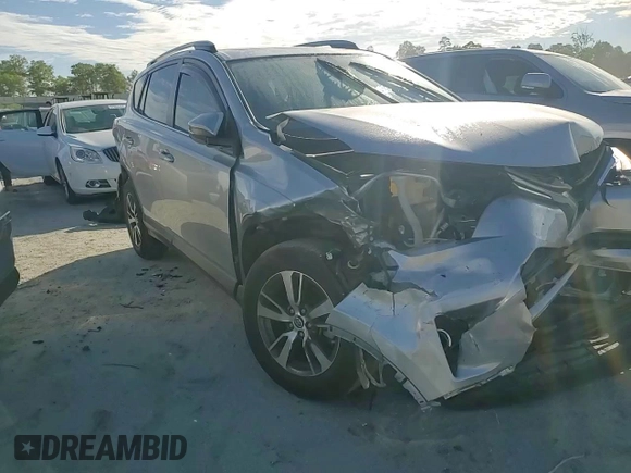 2018 Toyota RAV4 XLE with VIN JTMWFREV0JJ191707, listed as a Copart auction lot 57821575 with Not provided miles and Salvage title. Bid and sale history available at DreamBid. Image 13.