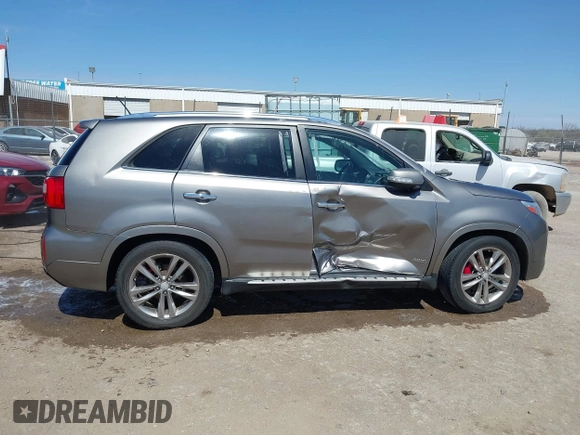2015 Kia Sorento SX with VIN 5XYKWDA74FG591902, listed as a IAAI auction lot 41856991 with 128,471 mi miles. Bid and sale history available at carsss.com. Image 13.