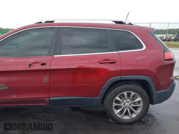 2019 Jeep Cherokee Latitude Plus with VIN 1C4PJMLB2KD104856, listed as a IAAI auction lot 42097709 with 89,552 mi miles and . Bid and sale history available at DreamBid. Image 19.