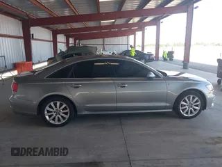 2012 Audi A6 3.0T Prestige with VIN WAUHGAFC6CN080091, listed as a IAAI auction lot 41964023 with 166,334 mi miles. Bid and sale history available at carsss.com. Image 13.