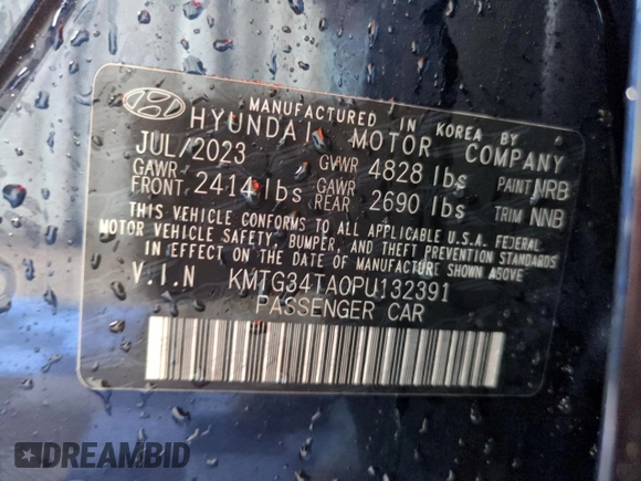 2023 Genesis G70 2.0T with VIN KMTG34TA0PU132391, listed as a Copart auction lot 72075974 with 17,479 mi miles and Salvage Title. Bid and sale history available at DreamBid. Image 12.
