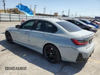 2023 BMW 3 Series 330i with VIN 3MW69FF00P8D52700, listed as a Copart auction lot 61629485 with 12,007 mi miles and Salvage title. Bid and sale history available at DreamBid. Image 2.
