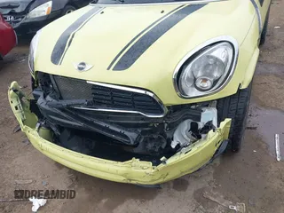 2012 MINI Countryman S z VIN WMWZC3C59CWL82955, wystawiony jako IAAI lot #42237702 z przebiegiem 61 903 mil mil oraz . Historia ofert i sprzedaży dostępna na DreamBid. Obrazek 6.