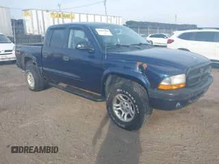 2004 Dodge Dakota Sport with VIN 1D7HG38N94S607983, listed as a IAAI auction lot 42082768 with 121,236 mi miles. Bid and sale history available at carsss.com. Image 1.