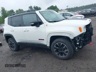 2023 Jeep Renegade Trailhawk z VIN ZACNJDC17PPP43612, wystawiony jako IAAI lot #42486733 z przebiegiem 17 658 mil mil oraz . Historia ofert i sprzedaży dostępna na DreamBid. Obrazek 14.