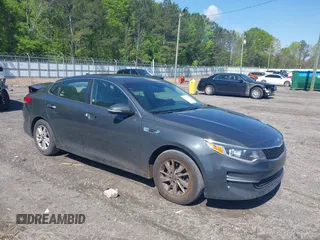 2016 Kia Optima LX with VIN KNAGT4L3XG5078248, listed as a IAAI auction lot 42011616 with 150,000 mi miles. Bid and sale history available at carsss.com. Image 1.