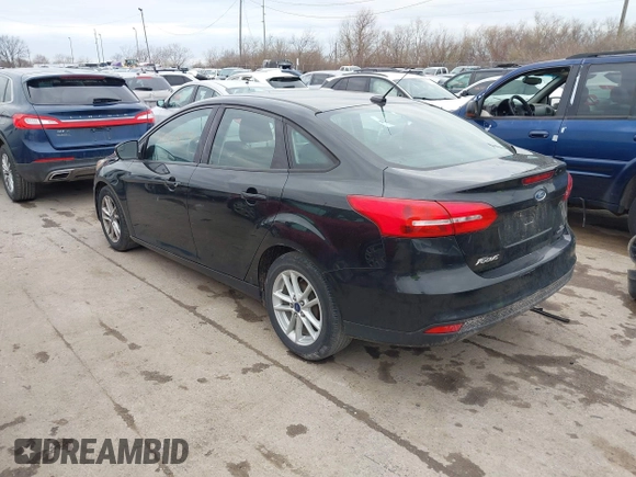 2015 Ford Focus SE with VIN 1FADP3F21FL355666, listed as a IAAI auction lot 41828579 with 110,002 mi miles. Bid and sale history available at carsss.com. Image 3.