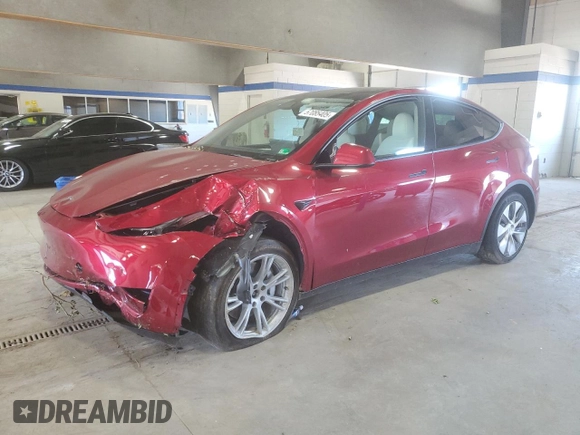 2024 Tesla Model Y Long Range with VIN 7SAYGDEE6RF995069, listed as a Copart auction lot 57085405 with 22,302 mi miles and Salvage title. Bid and sale history available at DreamBid. Image 1.