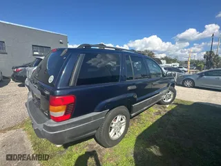 2004 Jeep Grand Cherokee Laredo with VIN 1J4GX48N24C436753, listed as a Copart auction lot 45039845 with 114,024 mi miles and Clean Title. Bid and sale history available at carsss.com. Image 4.