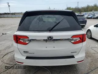 2020 Honda Odyssey Touring with VIN 5FNRL6H8XLB019365, listed as a Copart auction lot 52404335 with 59,486 mi miles and Salvage Title. Bid and sale history available at DreamBid. Image 6.