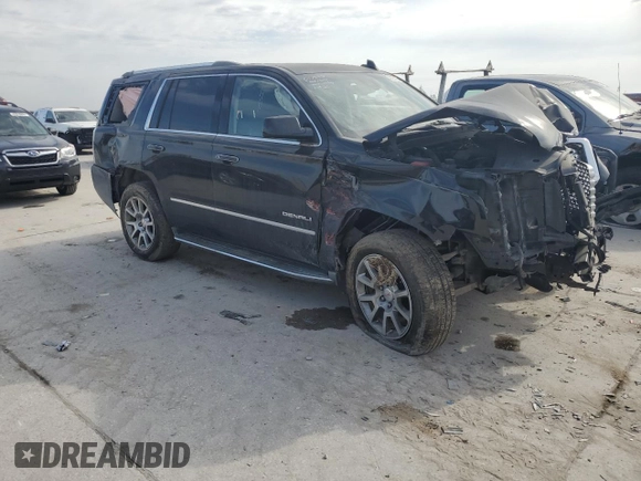 2015 GMC Yukon Denali with VIN 1GKS1CKJ2FR699959, listed as a Copart auction lot 42035195 with 0 mi miles and Salvage Title. Bid and sale history available at carsss.com. Image 4.