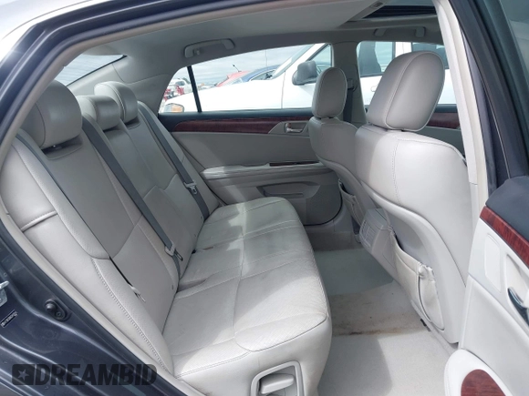 2012 Toyota Avalon with VIN 4T1BK3DB6CU459249, listed as a IAAI auction lot 41802571 with 147,955 mi miles. Bid and sale history available at carsss.com. Image 8.