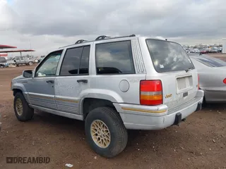 1995 Jeep Grand Cherokee Limited with VIN 1J4GZ78Y3SC649231, listed as a IAAI auction lot 41763953 with 140,889 mi miles. Bid and sale history available at carsss.com. Image 3.