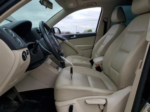 2011 Volkswagen Tiguan SE with VIN WVGBV7AX3BW551114, listed as a Copart auction lot 56016925 with 122,259 mi miles and Clean Title. Bid and sale history available at DreamBid. Image 7.