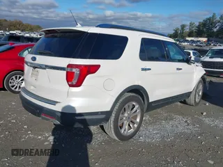 2019 Ford Explorer Limited z VIN 1FM5K7F82KGA03297, wystawiony jako IAAI lot #40847611 z przebiegiem 104 904 mil mil oraz . Historia ofert i sprzedaży dostępna na DreamBid. Obrazek 4.