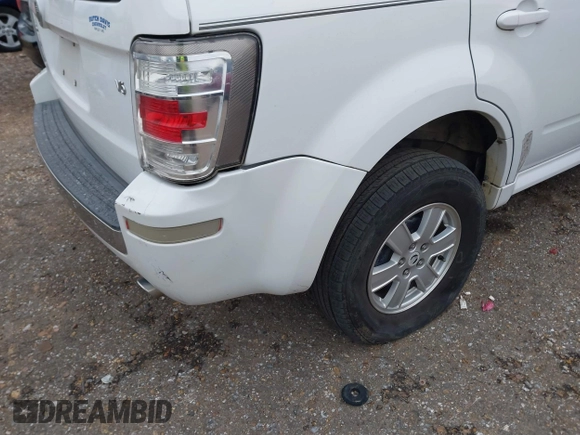 2008 Mercury Mariner with VIN 4M2CU81168KJ42757, listed as a IAAI auction lot 41257720 with Not provided miles and . Bid and sale history available at DreamBid. Image 6.
