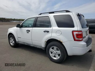 2010 Ford Escape Hybrid z VIN 1FMCU5K35AKC13081, wystawiony jako Copart lot #55447445 z przebiegiem 74 496 mil mil oraz Czysty tytuł • Clean title. Historia ofert i sprzedaży dostępna na DreamBid. Obrazek 2.