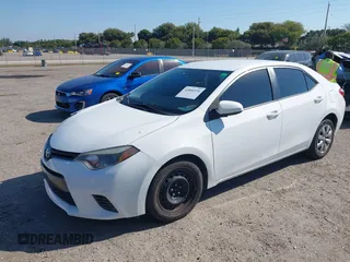 2015 Toyota Corolla L with VIN 2T1BURHE1FC252615, listed as a IAAI auction lot 41884936 with 113,805 mi miles and . Bid and sale history available at DreamBid. Image 17.