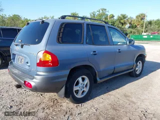 2003 Hyundai Santa Fe GLS with VIN KM8SC73D33U469955, listed as a IAAI auction lot 41989360 with 66,798 mi miles. Bid and sale history available at carsss.com. Image 4.