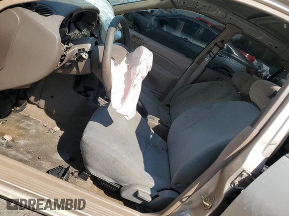 1999 Ford Escort SE z VIN 1FAFP13P7XW177713, wystawiony jako Copart lot #70439304 z przebiegiem 125 781 mil mil oraz Szkoda całkowita • Salvage title. Historia ofert i sprzedaży dostępna na DreamBid. Obrazek 7.