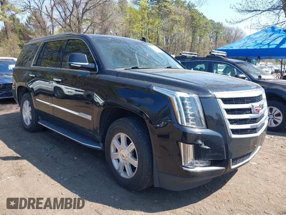 2019 Cadillac Escalade Luxury z VIN 1GYS4BKJ2KR214785, wystawiony jako IAAI lot #42026285 z przebiegiem 91 252 mil mil oraz . Historia ofert i sprzedaży dostępna na DreamBid. Obrazek 1.