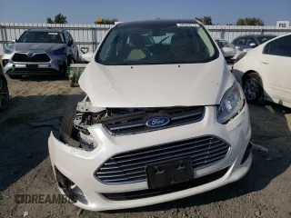 2016 Ford C-Max Energi SEL with VIN 1FADP5CU7GL100281, listed as a Copart auction lot 68333213 with 85,638 mi miles. Bid and sale history available at carsss.com. Image 5.