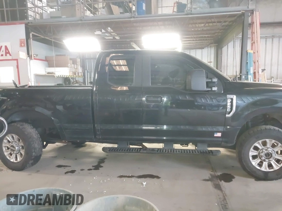 2021 Ford Super Duty F-250 SRW XL with VIN 1FT7X2B63MED51503, listed as a IAAI auction lot 41227248 with 106,780 mi miles. Bid and sale history available at carsss.com. Image 13.