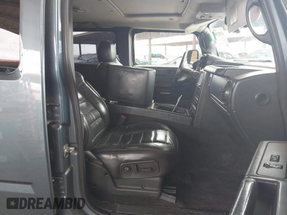 2005 Hummer H2 SUV with VIN 5GRGN23U25H107505, listed as a IAAI auction lot 41703768 with 213,723 mi miles. Bid and sale history available at carsss.com. Image 5.