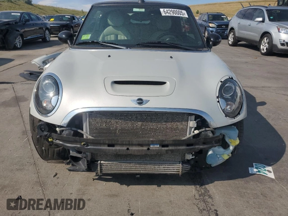 2012 MINI Convertible S z VIN WMWZP3C51CT296464, wystawiony jako Copart lot #64290005 z przebiegiem 107 580 mil mil oraz Szkoda całkowita • Salvage title. Historia ofert i sprzedaży dostępna na DreamBid. Obrazek 5.