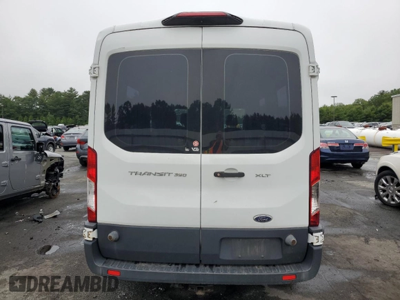 2018 Ford Transit Passenger XL with VIN 1FBZX2CM1JKB03144, listed as a Copart auction lot 60510545 with 181,060 mi miles and Salvage title. Bid and sale history available at DreamBid. Image 6.