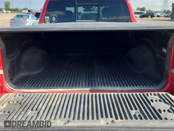 2023 Ram 1500 Big Horn with VIN 1C6RRFFG4PN561004, listed as a IAAI auction lot 42809372 with 75,509 mi miles and . Bid and sale history available at DreamBid. Image 12.