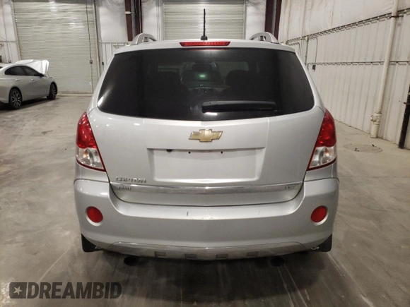2012 Chevrolet Captiva Sport LTZ with VIN 3GNFL4E5XCS609095, listed as a Copart auction lot 77334734 with 163,078 mi miles and Salvage Title. Bid and sale history available at DreamBid. Image 6.