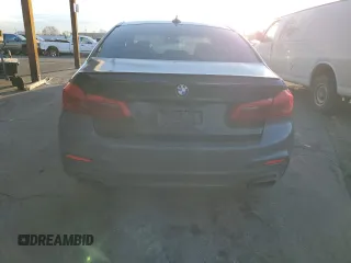 2019 BMW 5 Series M550i xDrive with VIN WBAJB9C55KB288709, listed as a Copart auction lot 46590735 with 58,256 mi miles and Salvage title. Bid and sale history available at DreamBid. Image 6.