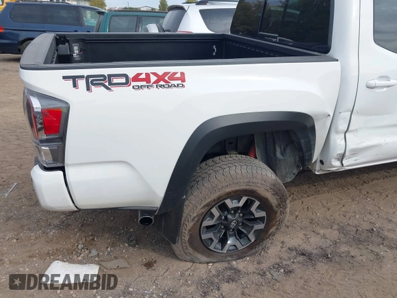 2023 Toyota Tacoma SR z VIN 3TMCZ5AN1PM637609, wystawiony jako IAAI lot #40345917 z przebiegiem 12 614 mil mil oraz . Historia ofert i sprzedaży dostępna na DreamBid. Obrazek 6.