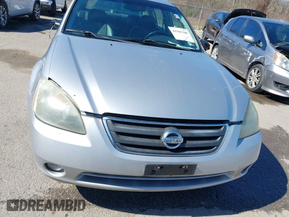 2003 Nissan Altima S with VIN 1N4AL11D63C321486, listed as a IAAI auction lot 41581386 with 200,082 mi miles. Bid and sale history available at carsss.com. Image 12.