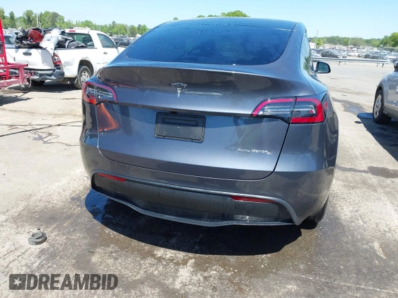 2023 Tesla Model Y Long Range with VIN 7SAYGDEE5PF882582, listed as a IAAI auction lot 42059015 with 10,567 mi miles and . Bid and sale history available at carsss.com. Image 16.