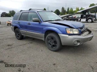 2003 Subaru Forester XS with VIN JF1SG656X3H700009, listed as a Copart auction lot 71077514 with 249,471 mi miles and Salvage Title. Bid and sale history available at carsss.com. Image 4.