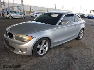 2012 BMW 1 Series 128i with VIN WBAUP9C55CVS94265, listed as a IAAI auction lot 41593276 with 135,929 mi miles. Bid and sale history available at carsss.com. Image 17.