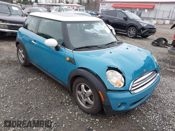 2009 MINI Cooper Hardtop with VIN WMWMF33569TW70413, listed as a IAAI auction lot 41776589 with 85,394 mi miles. Bid and sale history available at carsss.com. Image 1.
