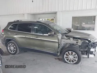 2021 Jeep Cherokee Altitude with VIN 1C4PJLLB5MD203569, listed as a IAAI auction lot 42559737 with 53,961 mi miles and . Bid and sale history available at DreamBid. Image 14.