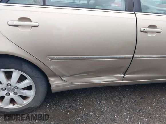 2002 Toyota Camry LE z VIN 4T1BE32K52U086150, wystawiony jako IAAI lot #42126685 z przebiegiem 175 212 mil mil oraz . Historia ofert i sprzedaży dostępna na DreamBid. Obrazek 6.
