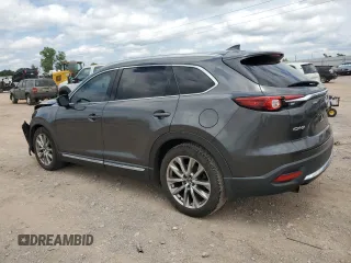 2016 Mazda CX-9 Grand Touring with VIN JM3TCADY3G0125814, listed as a Copart auction lot 58299595 with 127,035 mi miles and Salvage title. Bid and sale history available at DreamBid. Image 2.