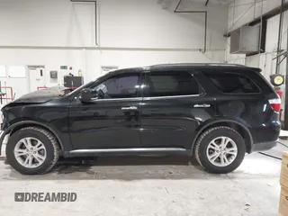 2013 Dodge Durango Crew with VIN 1C4SDJDT9DC670738, listed as a IAAI auction lot 41329419 with 149,520 mi miles and . Bid and sale history available at carsss.com. Image 15.